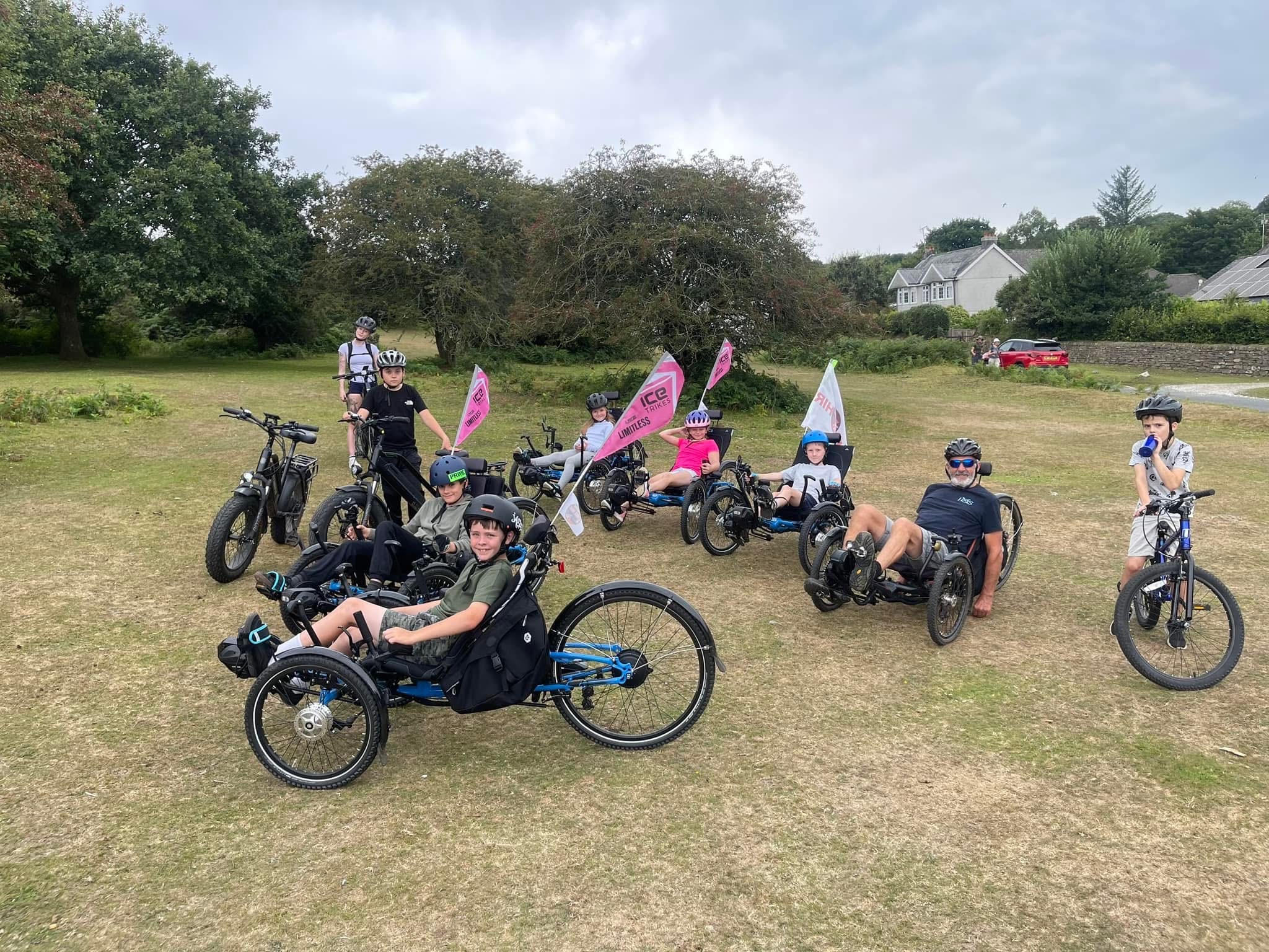Young people with electric recumbent trikes and bikes